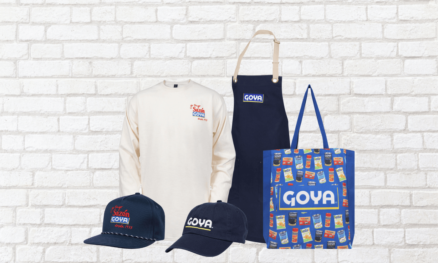 Goya merchandise on white brick background
