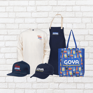 Goya merchandise on white brick background