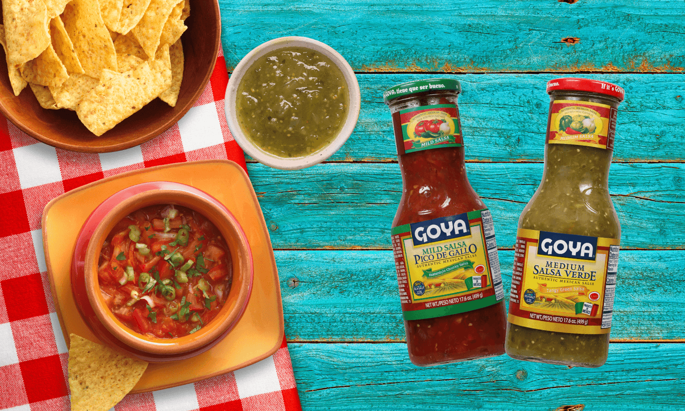 Various Goya Salsa with chips and salsas next to it.
